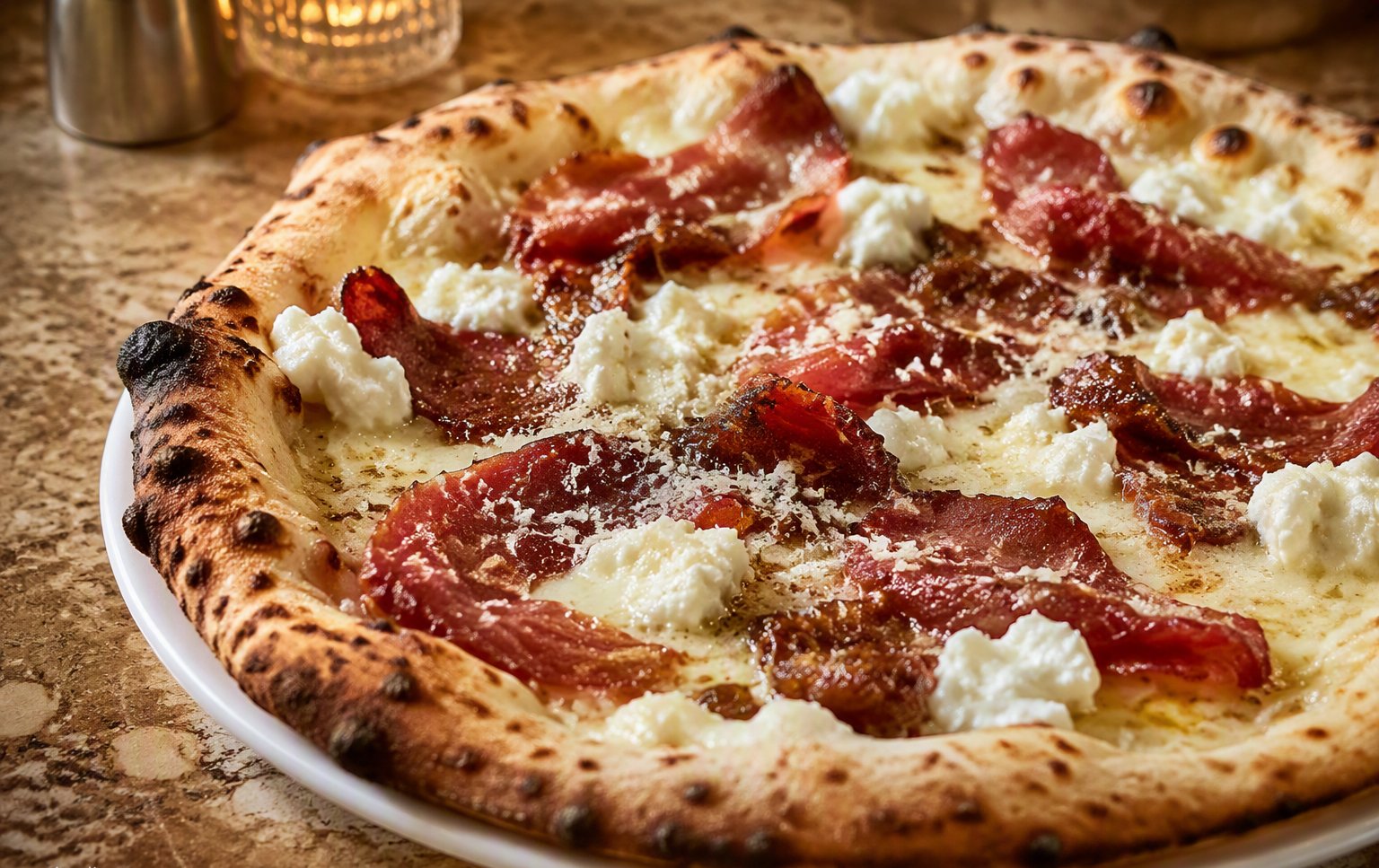 Pizza Mama Cocha - la firma della casa